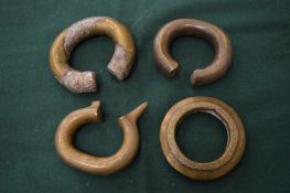 Four African brass bracelets.