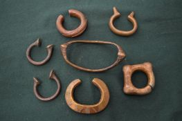 Seven African brass bracelets.