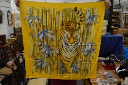 A Salvatore Ferragamo bamboo decorated silk scarf with original packaging.