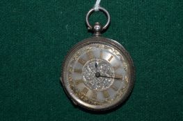A ladies silver pocket watch.