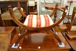 A mahogany dressing table stool or music seat.