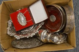 A collection of silver items to include two coasters, bonbon dish, sugar caster etc.