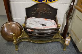 A Regency style fire grate.