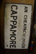 An Irish town name sign 'Cappamore'.