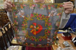 A Moschino floral silk scarf.