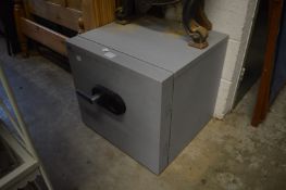 A modern safe complete with key.