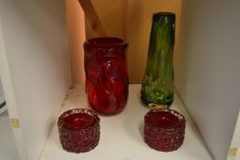 Decorative glassware to include two moulded vases and a pair of candle stands.