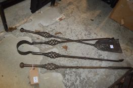 Wrought iron fireside companion set.