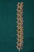 A gilt metal and lapis bracelet.