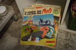 A quantity of Asterix annuals.