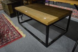 A modern steel framed rectangular coffee table.