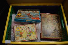 A quantity of old puzzles and games.