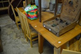 A modern oak extending dining table.
