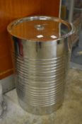 Polished steel circular storage container.