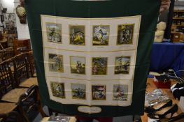 A Burberry diary silk scarf.