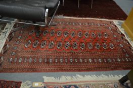 A small Bokhara rug, 185cm x 120cm.