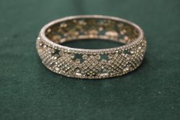A diamante bangle.