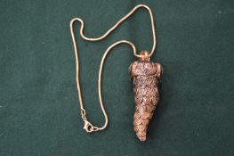 Kenneth Lane, a large acorn shaped pendant, signed.