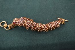 A Kenneth Lane crocodile bracelet.