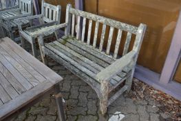 A hardwood garden bench.