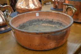A copper preserve pan.