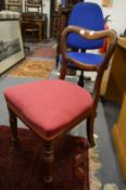 A set of five William IV rosewood kidney back dining chairs together with a similar armchair.