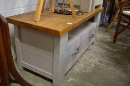 A pine and painted pine two drawer TV stand.