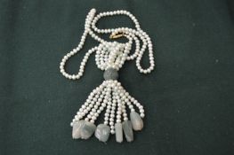 Large pearl and jade necklace.