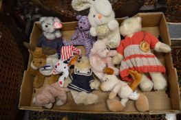 A group of Beanie Babies and other soft toys.