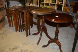 Two nests of tables and two occasional tables.