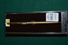 A boxed Papermate pen.