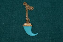 A decorative pendant and chain.