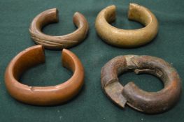Four African brass bracelets.