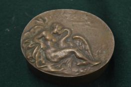 A small oval bronze box and cover.