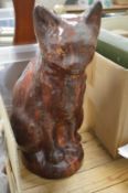 A Ewenny treacle glazed pottery cat (restored).