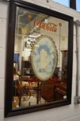 A Coca-Cola advertising mirror.