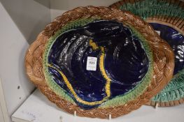 Two majolica stands.