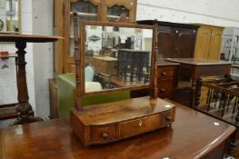 A George III mahogany dressing table mirror.