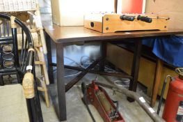 A Liberty & Co oak draw leaf dining table.