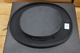 A collapsible (theatre) top hat.