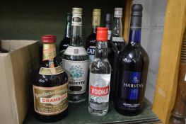 Bottle of Drambuie and other items.