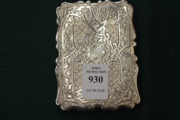 An engraved silver calling card case.