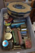 A collection of early advertising tins.