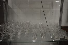 Part suite of cut glass drinking glasses and other glassware.