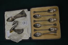A cased set of six silver coffee spoons and other items.