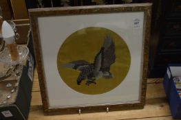 A small Chinese circular silk work picture on an eagle, framed and glazed.