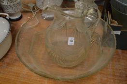 Large cut glass jug and bowl set.