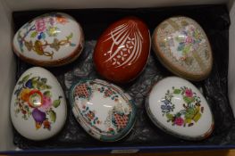 Six Herend porcelain egg boxes.