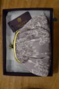 A Liberty of London evening bag with original box.