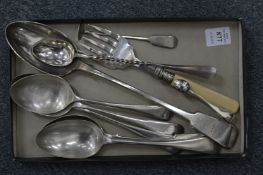 Small group of plated items.